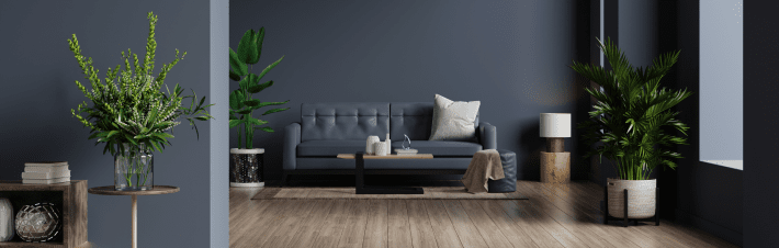 interior-living-room-with-sofa-empty-dark-blue-wall-3d-rendering 1